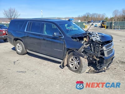 Czwarte zdjęcie samochodu z boku: 2015 CHEVROLET SUBURBAN K1500 LT VIN:1GNSKJKCXFR587948 - miniatura