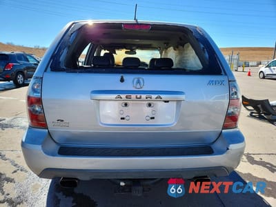 Zdjęcie 6 z 13 samochodu: 2004 ACURA MDX TOURING VIN:2HNYD18884H540912 - miniatura