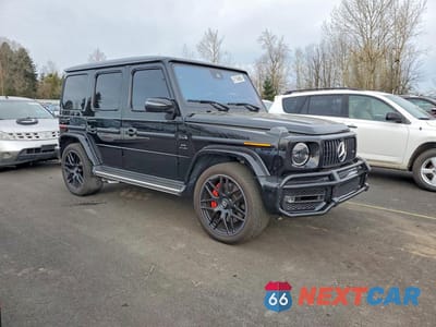 Czwarte zdjęcie samochodu z boku: 2021 MERCEDES-BENZ G 63 AMG VIN:W1NYC7HJ0MX401019 - miniatura
