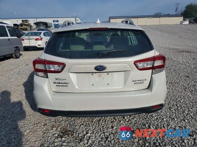 Zdjęcie 6 z 13 samochodu: 2017 SUBARU IMPREZA PREMIUM PLUS VIN:4S3GTAD66H3715949 - miniatura