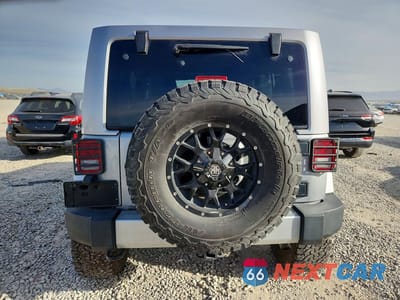 Zdjęcie 6 z 12 samochodu: 2014 JEEP WRANGLER UNLIMITED RUBICON VIN:1C4BJWFG9EL186317 - miniatura