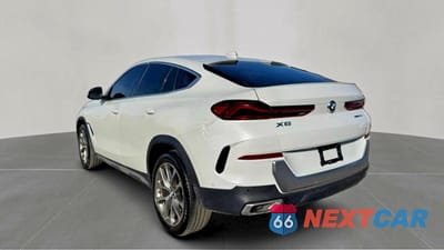 Trzecie zdjęcie samochodu z tyłu: 2021 BMW X6 XDRIVE40I VIN:5UXCY6C03M9E61751 - miniatura
