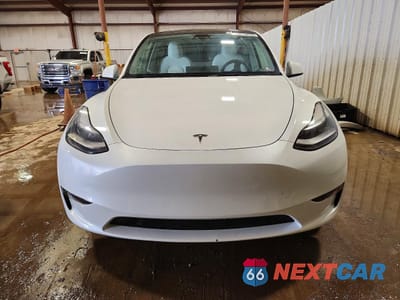 Piąte zdjęcie samochodu w środku: 2023 TESLA MODEL Y VIN:7SAYGAEE4PF647752 - miniatura