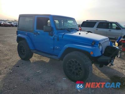 Czwarte zdjęcie samochodu z boku: 2016 JEEP WRANGLER SAHARA VIN:1C4AJWBG5GL140973 - miniatura