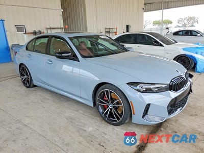 Czwarte zdjęcie samochodu z boku: 2024 BMW 330I VIN:3MW69FF06R8E61116 - miniatura