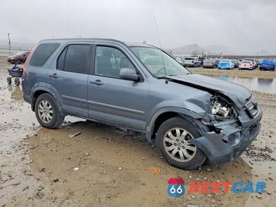 Czwarte zdjęcie samochodu z boku: 2006 HONDA CR-V SE VIN:JHLRD78926C047032 - miniatura