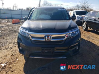 Piąte zdjęcie samochodu w środku: 2021 HONDA PILOT EX VIN:5FNYF6H59MB032179 - miniatura