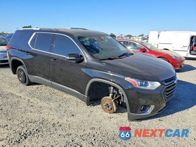 Czwarte zdjęcie samochodu z boku: 2018 CHEVROLET TRAVERSE LT VIN:1GNERGKW6JJ175507 - miniatura