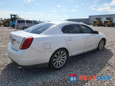 Trzecie zdjęcie samochodu z tyłu: 2011 LINCOLN MKS VIN:1LNHL9FT3BG606155 - miniatura