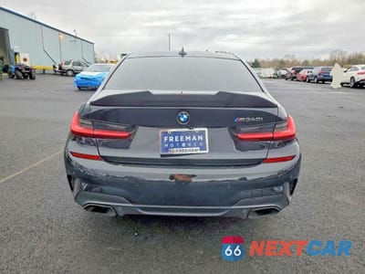 Zdjęcie 6 z 12 samochodu: 2021 BMW M340I VIN:3MW5U7J07M8B53324 - miniatura