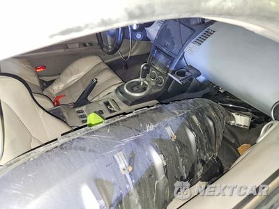 Zdjęcie 13 z 14 samochodu: 2004 NISSAN 350Z BASE VIN:JN1AZ34E84M154152 - miniatura