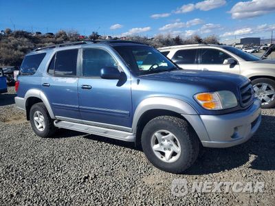 Czwarte zdjęcie samochodu z boku: 2002 TOYOTA SEQUOIA SR5 VIN:5TDBT44A72S126527 - miniatura