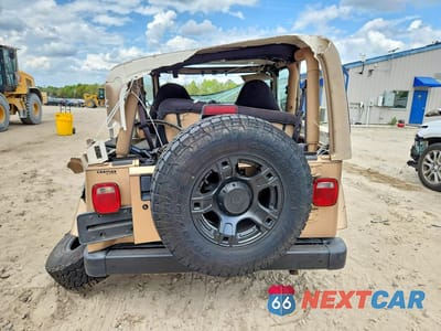 Zdjęcie 6 z 13 samochodu: 1999 JEEP WRANGLER / TJ SAHARA VIN:1J4FY49S4XP450485 - miniatura