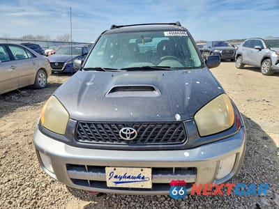 Piąte zdjęcie samochodu w środku: 2003 TOYOTA RAV4 BASE VIN:JTEGH20V930117848 - miniatura