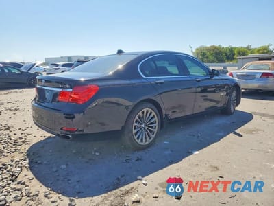 Trzecie zdjęcie samochodu z tyłu: 2012 BMW 740 I VIN:WBAKA4C57CC613317 - miniatura