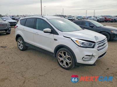 Czwarte zdjęcie samochodu z boku: 2019 FORD ESCAPE TITANIUM VIN:1FMCU9J98KUA96325 - miniatura