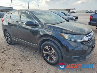 Czwarte zdjęcie samochodu z boku: 2018 HONDA CR-V LX VIN:2HKRW5H33JH403881 - miniatura