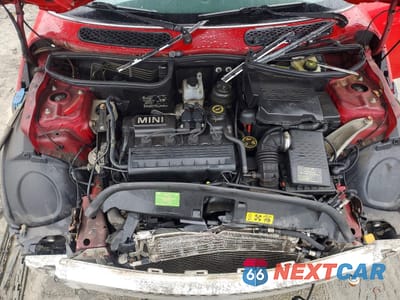 Zdjęcie 11 z 13 samochodu: 2003 MINI COOPER VIN:WMWRC33473TE17164 - miniatura