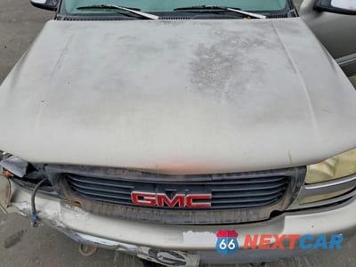 Zdjęcie 11 z 12 samochodu: 1999 GMC NEW SIERRA C1500 VIN:1GTEC14V2XZ512471 - miniatura