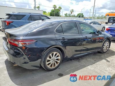 Trzecie zdjęcie samochodu z tyłu: 2024 TOYOTA CAMRY LE VIN:4T1C11AK3RU856281 - miniatura