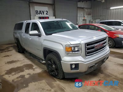 Czwarte zdjęcie samochodu z boku: 2015 GMC SIERRA K1500 VIN:1GTV2TEC3FZ293689 - miniatura