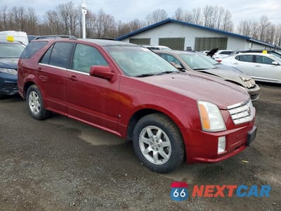 Czwarte zdjęcie samochodu z boku: 2006 CADILLAC SRX VIN:1GYEE637560176354 - miniatura