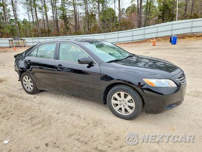 Czwarte zdjęcie samochodu z boku: 2009 TOYOTA CAMRY HYBRID BASE VIN:JTNBB46K593051424 - miniatura