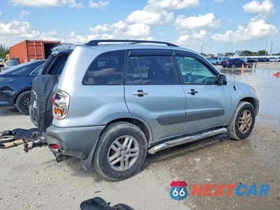 Trzecie zdjęcie samochodu z tyłu: 2001 TOYOTA RAV4 BASE VIN:JTEGH20V910028908 - miniatura