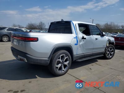 Trzecie zdjęcie samochodu z tyłu: 2023 RIVIAN R1T R1 VIN:7FCTGBAA9PN025045 - miniatura