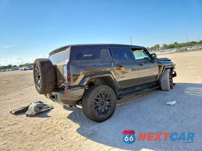 Trzecie zdjęcie samochodu z tyłu: 2026 GMC HUMMER SUV 2X VIN:1GKTEHDE8TU601273 - miniatura