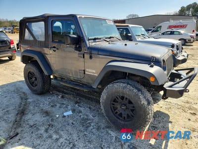 Czwarte zdjęcie samochodu z boku: 2017 JEEP WRANGLER SPORT VIN:1C4AJWAG9HL547701 - miniatura