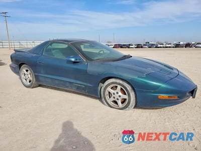 Czwarte zdjęcie samochodu z boku: 1997 PONTIAC FIREBIRD VIN:2G2FS22K9V2208483 - miniatura