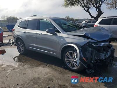 Czwarte zdjęcie samochodu z boku: 2024 CADILLAC XT6 PREMIUM LUXURY VIN:1GYKPCRS1RZ721084 - miniatura