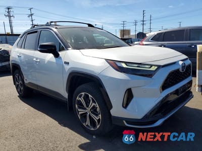 Czwarte zdjęcie samochodu z boku: 2024 TOYOTA RAV4 PRIME XSE VIN:JTMFB3FV5RD226808 - miniatura