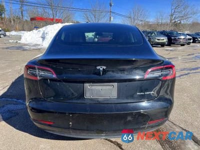 Czwarte zdjęcie samochodu z boku: 2022 TESLA MODEL 3 VIN:5YJ3E1EB6NF259227 - miniatura