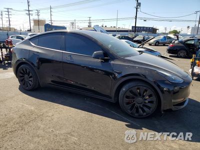 Czwarte zdjęcie samochodu z boku: 2022 TESLA MODEL Y VIN:7SAYGDEF4NF489680 - miniatura