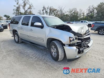 Czwarte zdjęcie samochodu z boku: 2011 CHEVROLET SUBURBAN C1500 LS VIN:1GNSCHE07BR120844 - miniatura