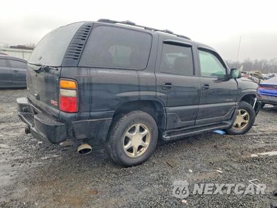 Trzecie zdjęcie samochodu z tyłu: 2004 GMC YUKON DENALI VIN:1GKEK63U54J135982 - miniatura