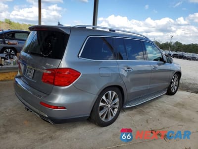 Trzecie zdjęcie samochodu z tyłu: 2015 MERCEDES-BENZ GL 450 4MATIC VIN:4JGDF6EE0FA516011 - miniatura