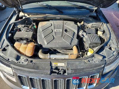 Zdjęcie 12 z 13 samochodu: 2014 JEEP GRAND CHEROKEE OVERLAND VIN:1C4RJFCM2EC423741 - miniatura