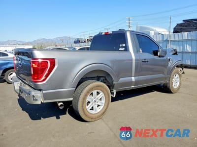 Trzecie zdjęcie samochodu z tyłu: 2022 FORD F150 VIN:1FTMF1CPXNKE22707 - miniatura