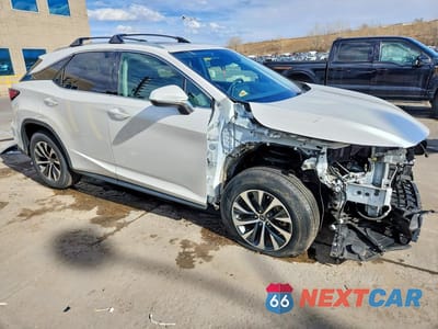 Czwarte zdjęcie samochodu z boku: 2021 LEXUS RX 350 BASE VIN:2T2HZMDA7MC261572 - miniatura