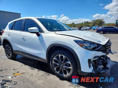 Czwarte zdjęcie samochodu z boku: 2016 MAZDA CX-5 GT VIN:JM3KE4DY9G0843097 - miniatura