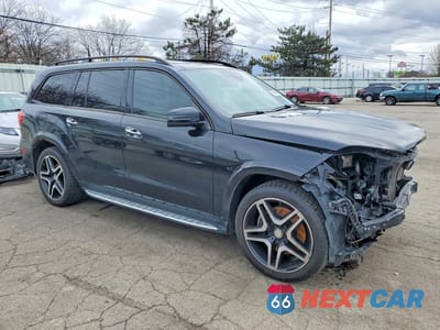 Czwarte zdjęcie samochodu z boku: 2017 MERCEDES-BENZ GLS 550 4MATIC VIN:4JGDF7DE0HA755147 - miniatura