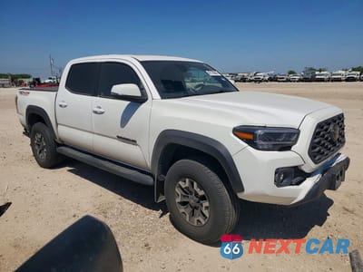 Czwarte zdjęcie samochodu z boku: 2022 TOYOTA TACOMA TRD OFF-ROAD VIN:3TMCZ5AN5NM492586 - miniatura