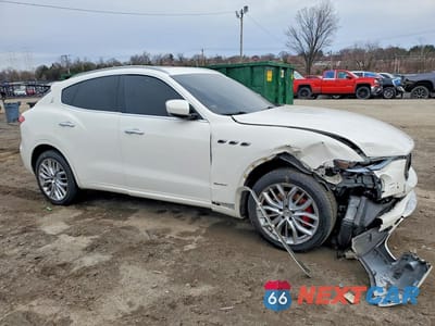 Czwarte zdjęcie samochodu z boku: 2020 MASERATI LEVANTE LUXURY VIN:ZN661XUL6LX349257 - miniatura
