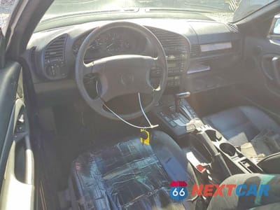 Zdjęcie 8 z 13 samochodu: 1996 BMW 328 IC AUTOMATIC VIN:WBABK8329TET90390 - miniatura