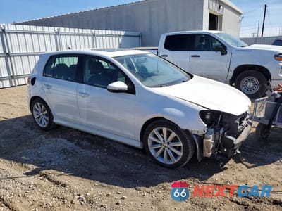 Czwarte zdjęcie samochodu z boku: 2014 VOLKSWAGEN GOLF VIN:WVWDM7AJ4EW010881 - miniatura