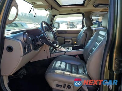 Zdjęcie 7 z 13 samochodu: 2003 HUMMER H2 VIN:5GRGN23U43H107700 - miniatura