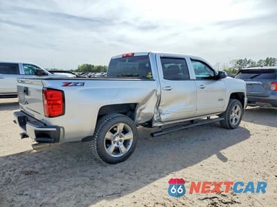 Trzecie zdjęcie samochodu z tyłu: 2018 CHEVROLET SILVERADO K1500 LT VIN:3GCUKREC8JG619977 - miniatura